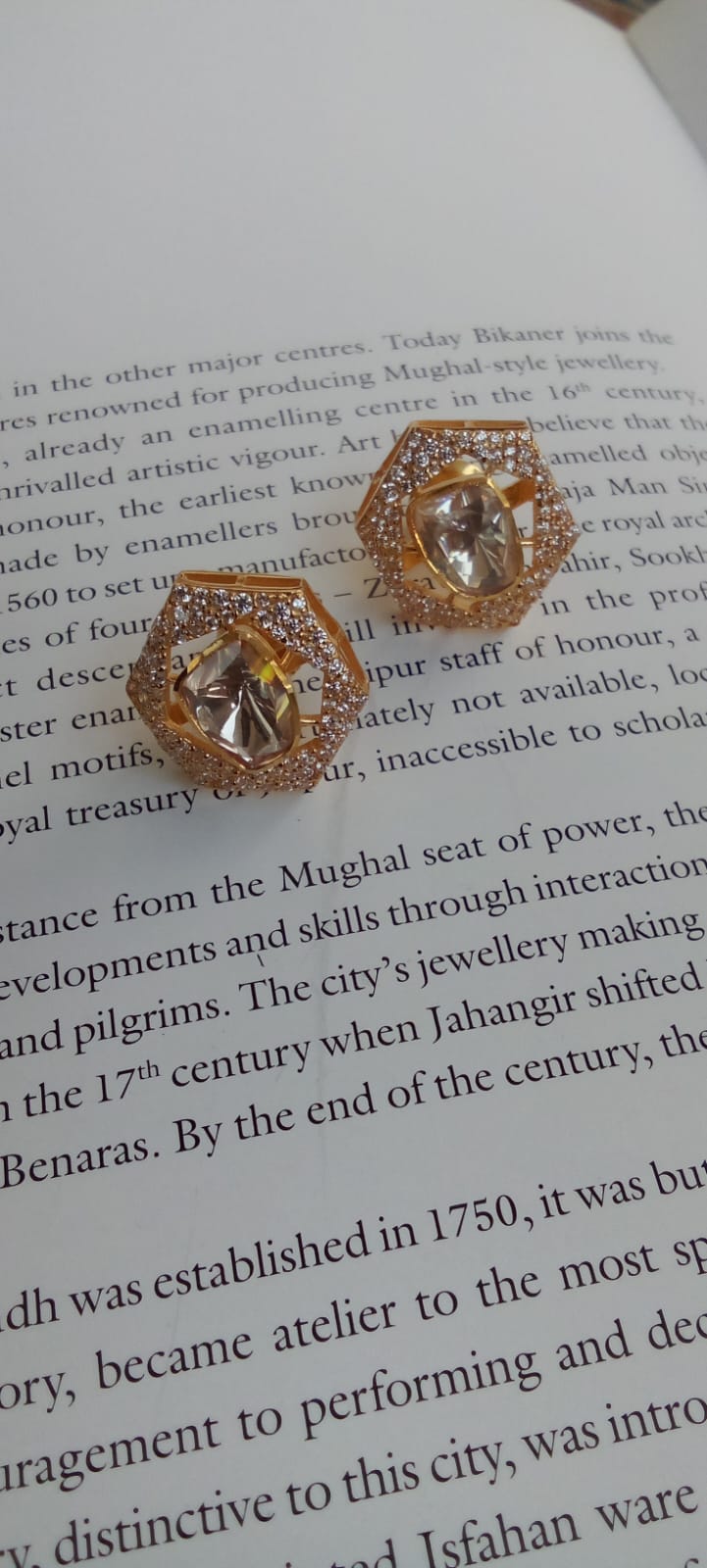 Gold plated moissanite studs.