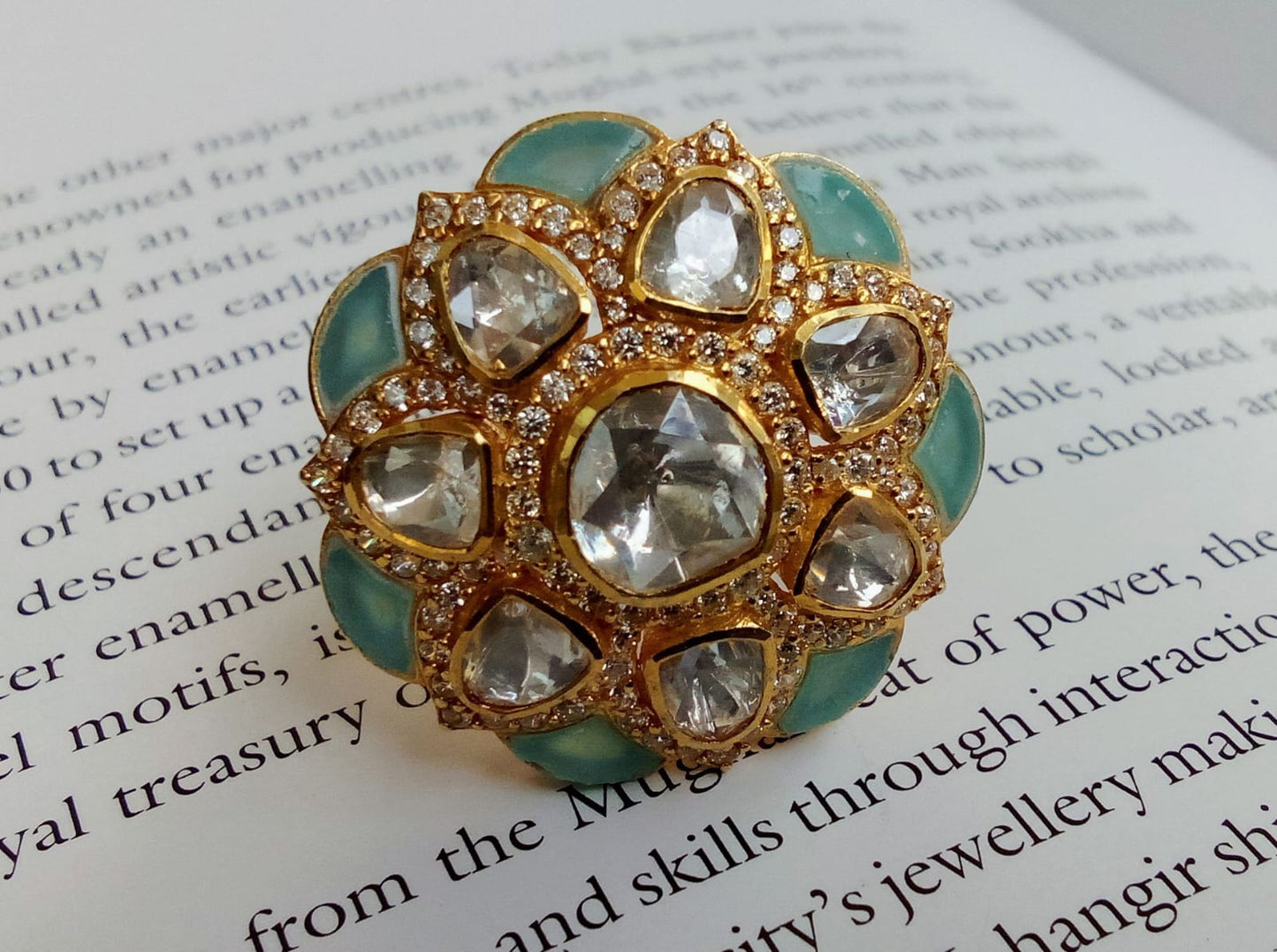 Gold plated Moissanite colour stones ring.
