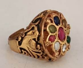 Sterling Silver ring in Navrattan stones with 18 Karat Gold plating.