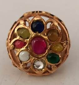 Sterling Silver ring in Navrattan stones with 18 Karat Gold plating.