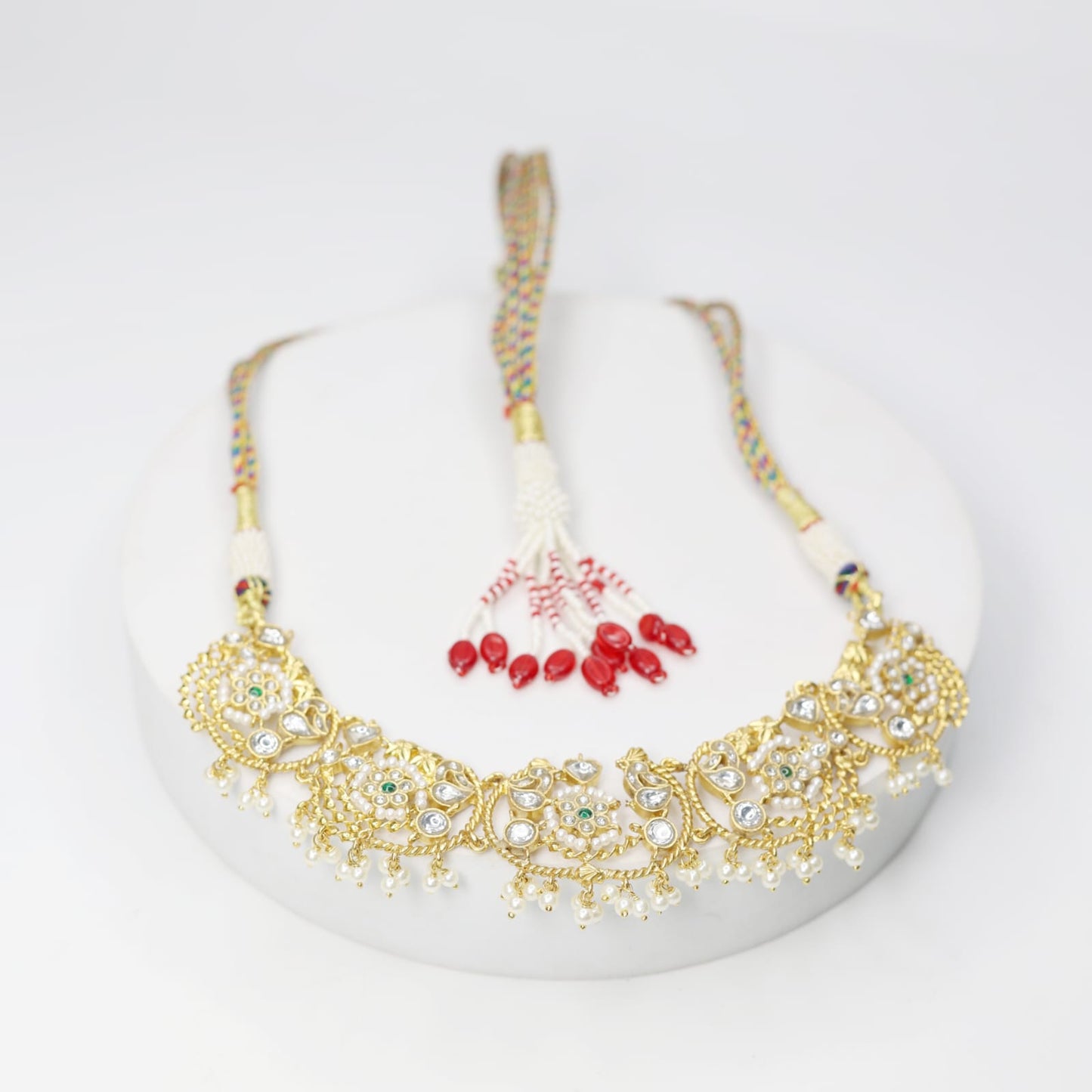 Sterling Silver necklace with 18 karat gold plating with Billor Polki and pearls in Sarafa closure.
Length 20 inches.