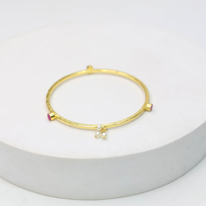 Stacking Bracelet/Bangle in 
92.5 sterling silver in 18 karat Gold plating with Pearls and red Quartz.