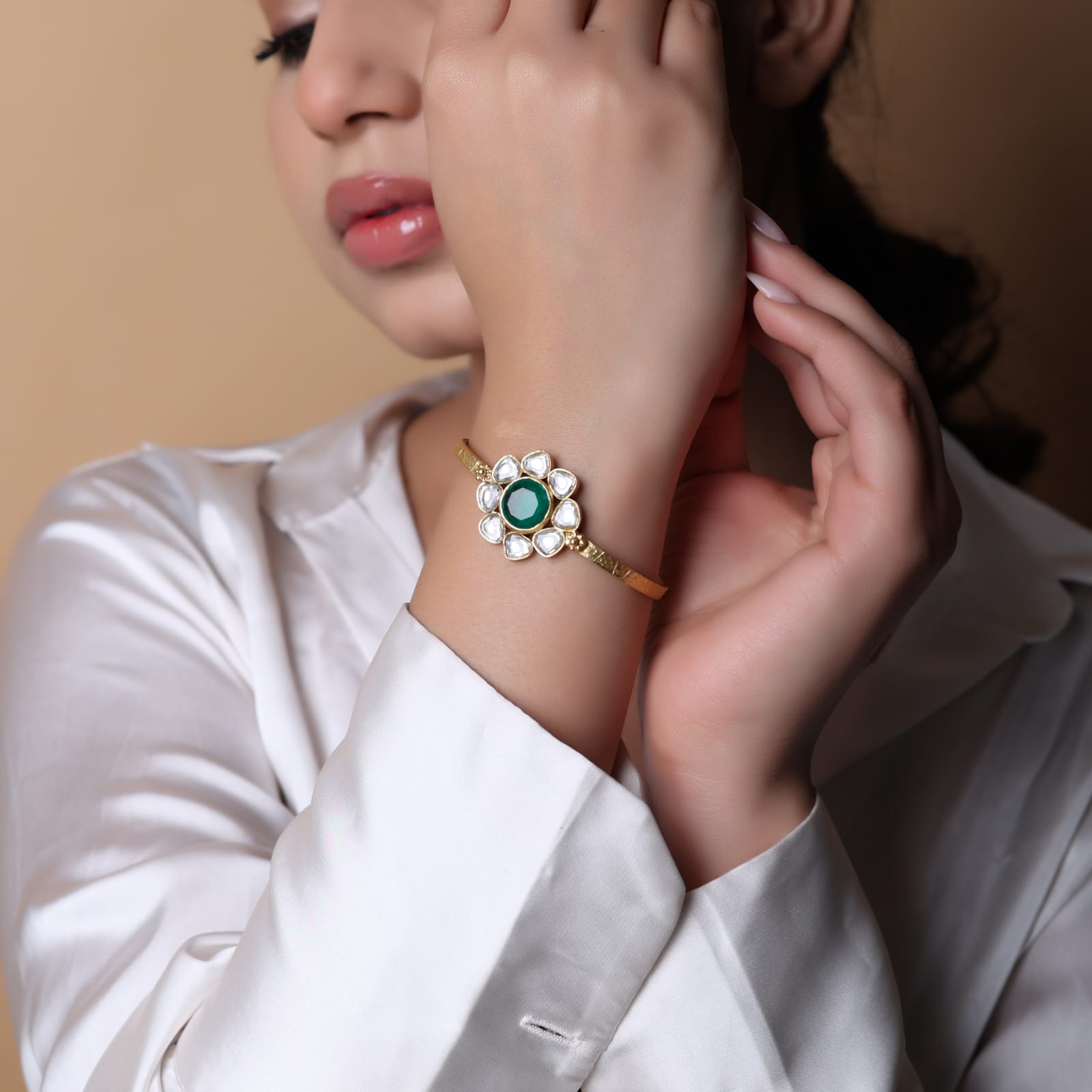 Handcrafted sterling Silver bracelet with 1 micron gold plating.
Green onyx and billor Polki 
Textured open stacking bracelet.
Size- Adjustable