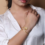 Load image into Gallery viewer, Textured leaf bracelet
Handcrafted sterling silver bracelet with 1 micron gold plating in Open stacking bracelet.
Size- Adjustable
