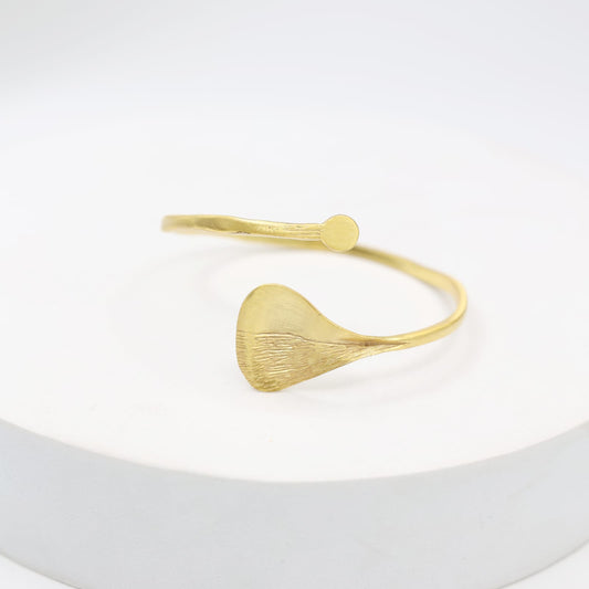 Textured leaf bracelet
Handcrafted sterling silver bracelet with 1 micron gold plating in Open stacking bracelet.
Size- Adjustable