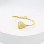Load image into Gallery viewer, Textured leaf bracelet
Handcrafted sterling silver bracelet with 1 micron gold plating in Open stacking bracelet.
Size- Adjustable
