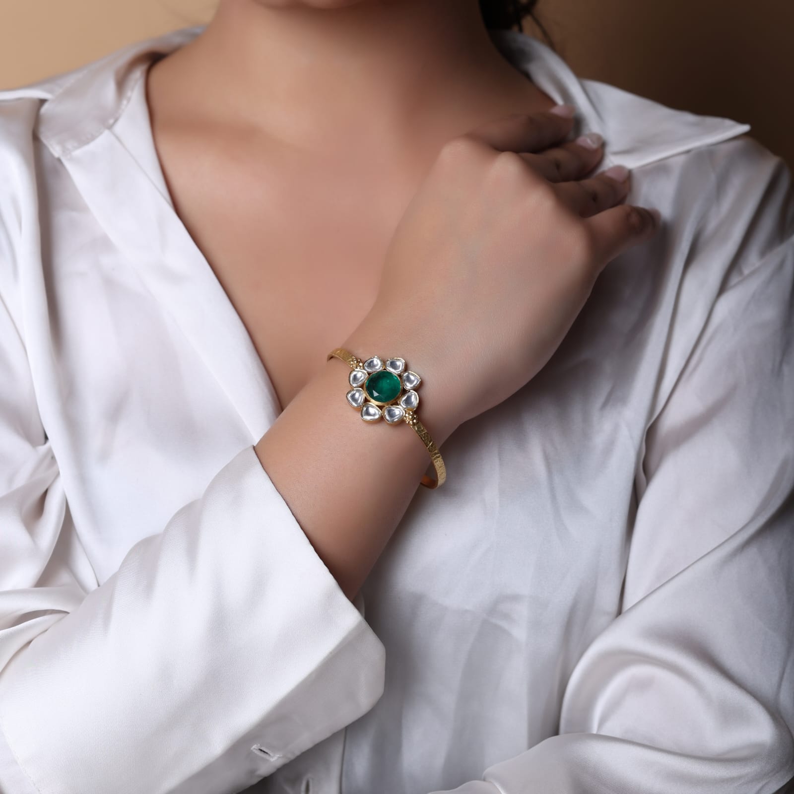 Handcrafted sterling Silver bracelet with 1 micron gold plating.
Green onyx and billor Polki 
Textured open stacking bracelet.
Size- Adjustable