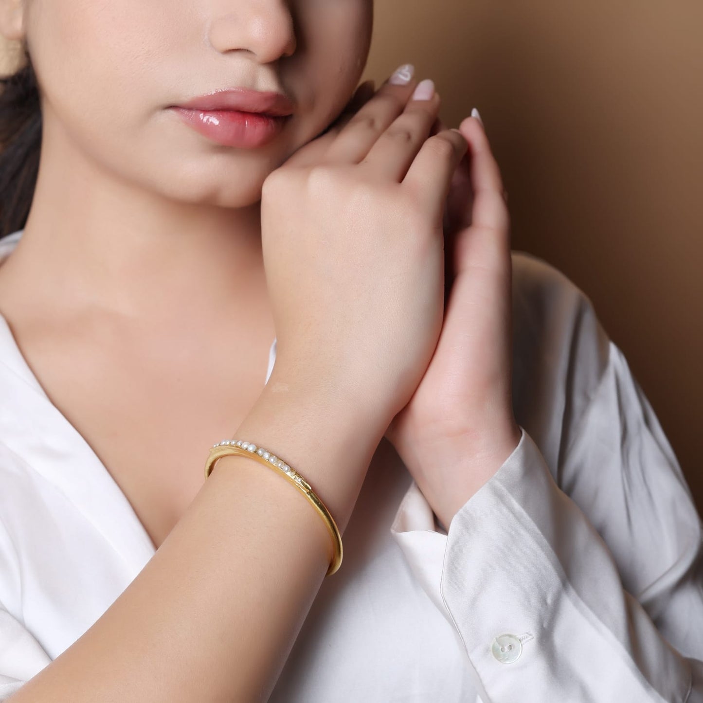 Handcrafted Pearl bracelet in sterling Silver studded with fresh water pearls
1 micron gold plating, adjustable.