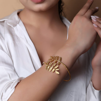 Silver alloy bracelet with 1 micron gold plating in textured design, adjustable.