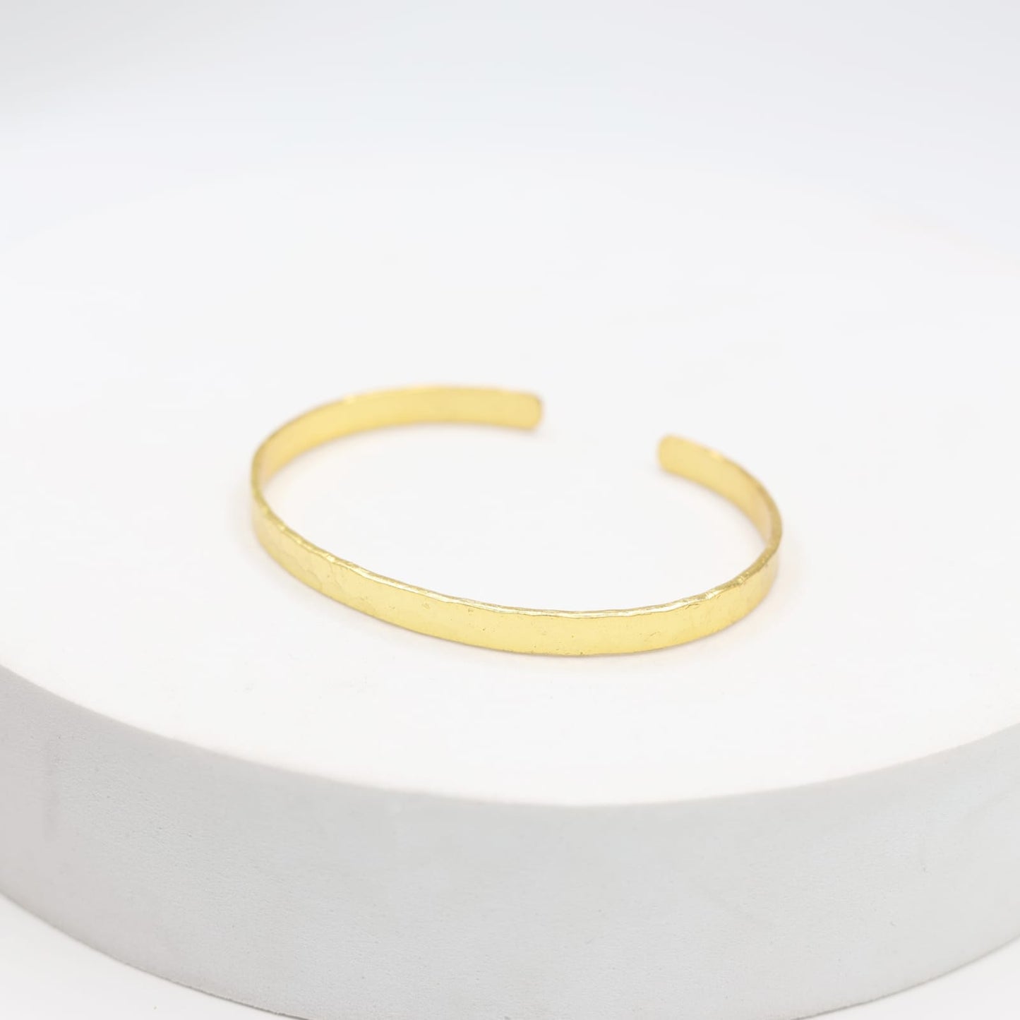 Handmade sterling Silver bangle with 1 micron Gold plating.