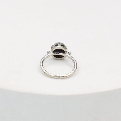 Sterling Silver ring in carved stone with an elegant look, adjustable.