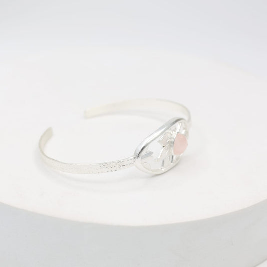 Sterling Silver bangle in rose Quartz with floral pattern, adjustable.