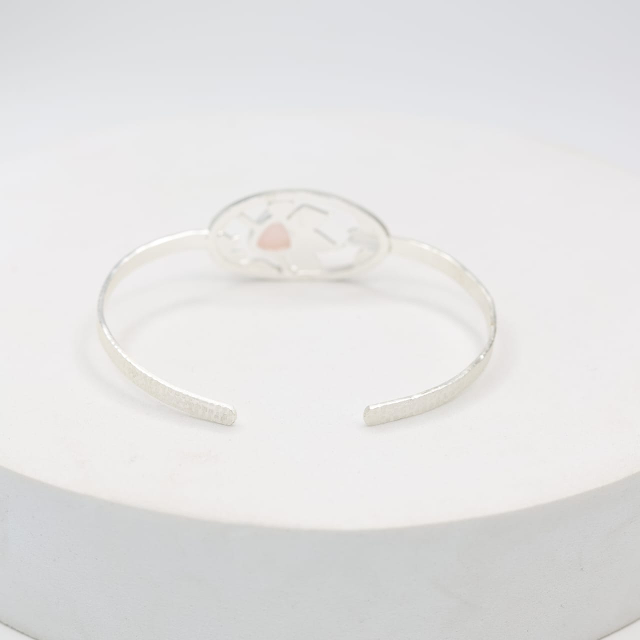 Sterling Silver bangle in rose Quartz with floral pattern, adjustable.