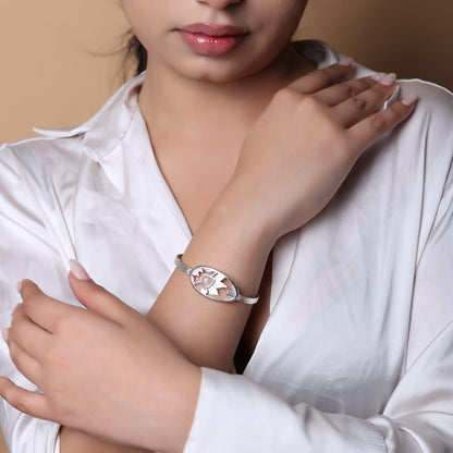 Sterling Silver bangle in rose Quartz with floral pattern, adjustable.