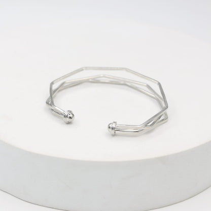 Sterling Silver Stacking bracelet in a geometric shape, adjustable.