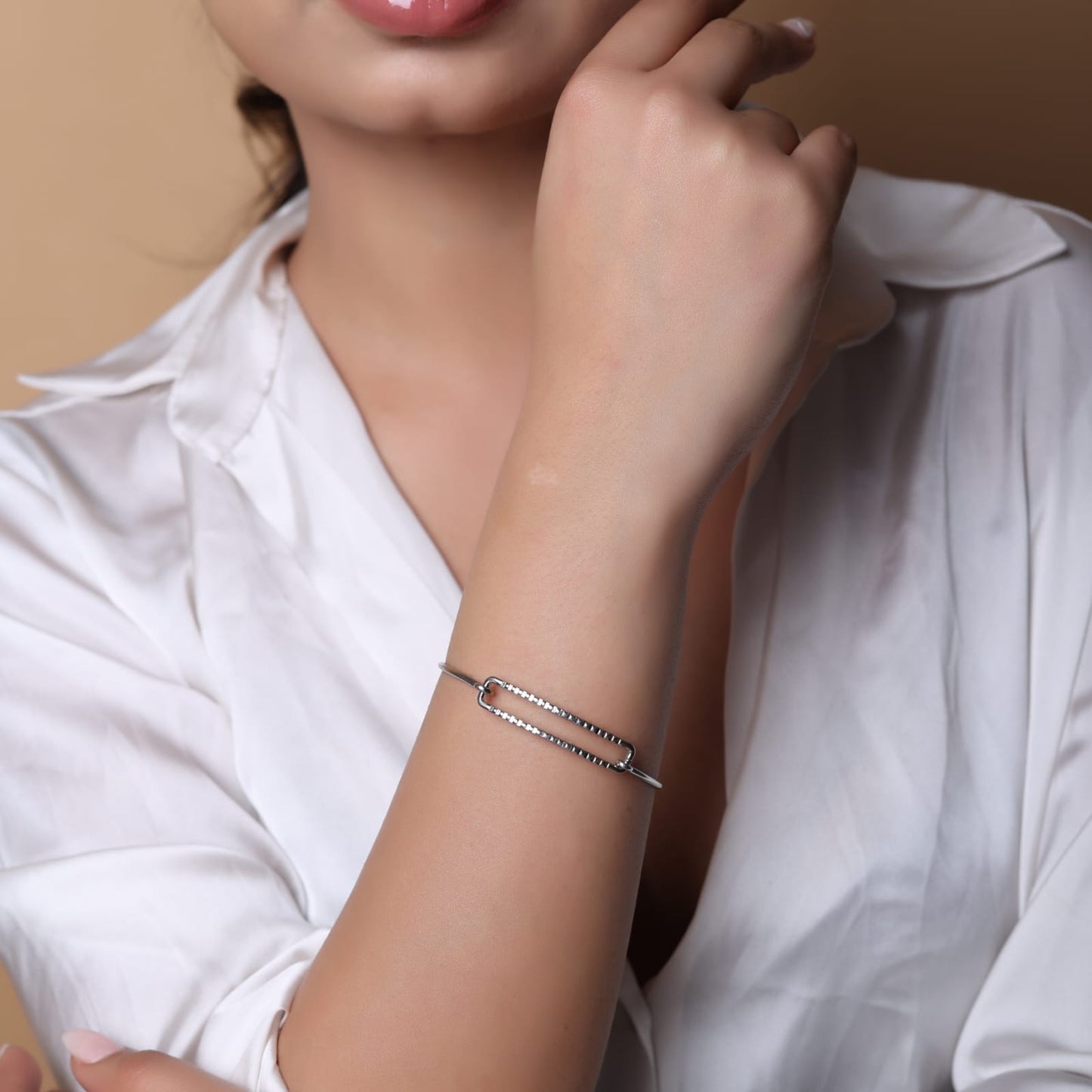 Sterling Silver stacking bracelet in a geometric shape with twisted wire, made to size.