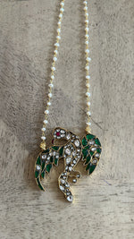 Load image into Gallery viewer, Parinda pendant in Sterling Silver necklace with jadau in a fresh water pearl chain with 18 carat micron plating with thread sarafa closure.
