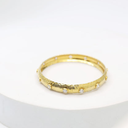 Sterling Silver Gold plated
Polki bangle with texture Gold plating.