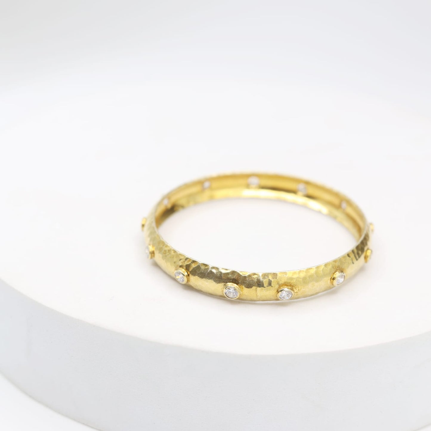 Sterling Silver Gold plated
Polki bangle with texture Gold plating.