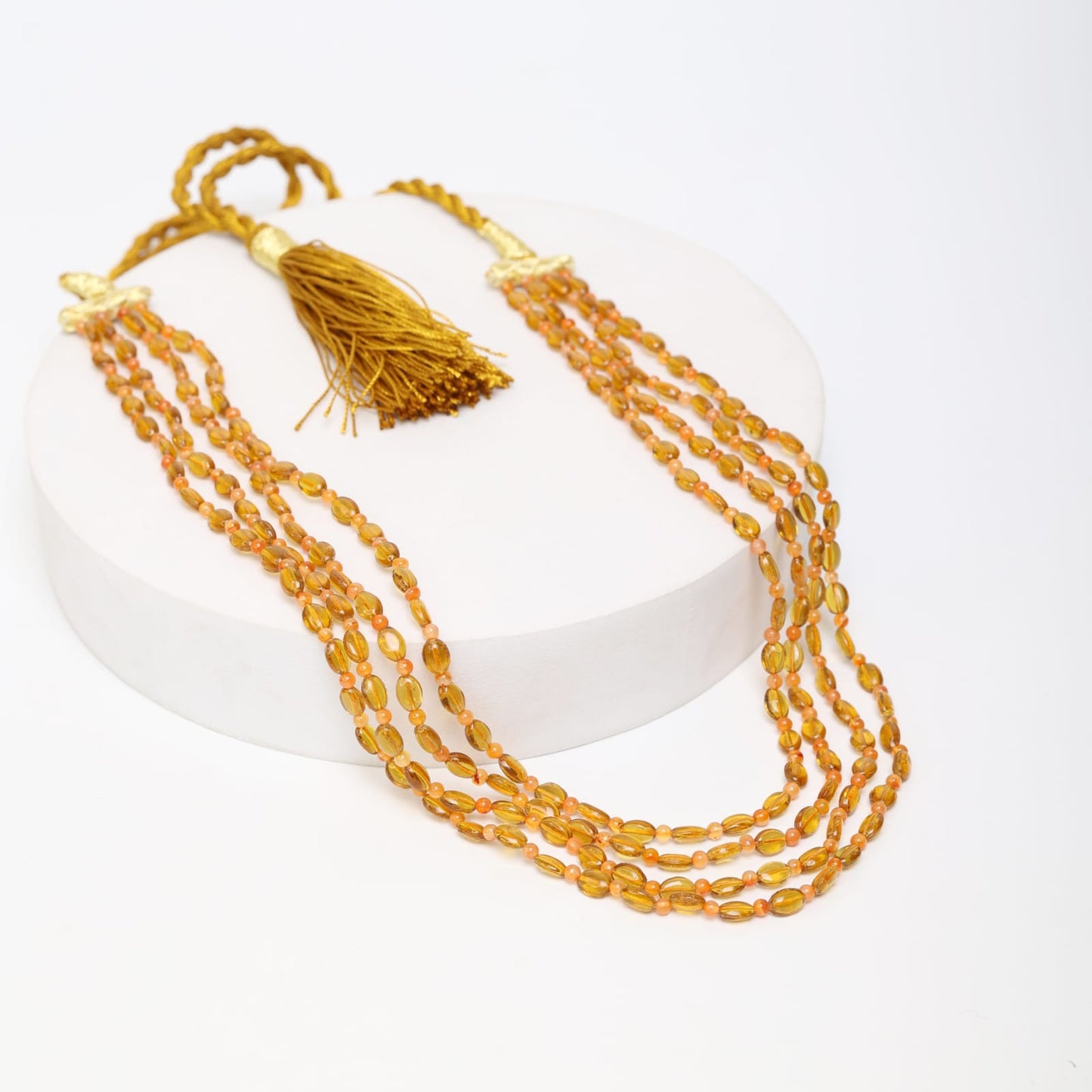 Yellow Quartz and beads in double layered string necklace in Sarafa closure. 
Length: 18-20 inches.