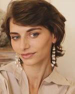 Load image into Gallery viewer, Pearls of joy earrings in 92.5 Sterling Silver with fresh water Pearls hook earrings in 1 micron Gold plating.
