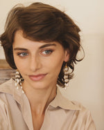 Load image into Gallery viewer, Pearls of joy earrings in 92.5 Sterling Silver with fresh water Pearls hook earrings in 1 micron Gold plating.
