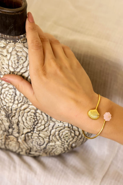 Shelja Bracelet in 92.5 Sterling Silver with 1 micron Gold plated with carved rose Quartz, size adjustable.