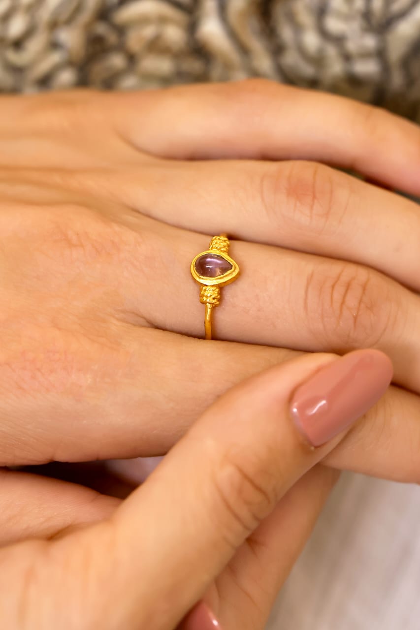 Prachi Ring in 92.5 Sterling Silver, dipped in 1 micron Gold plated with
Semi precious Amythest Ring,
Size made to order.