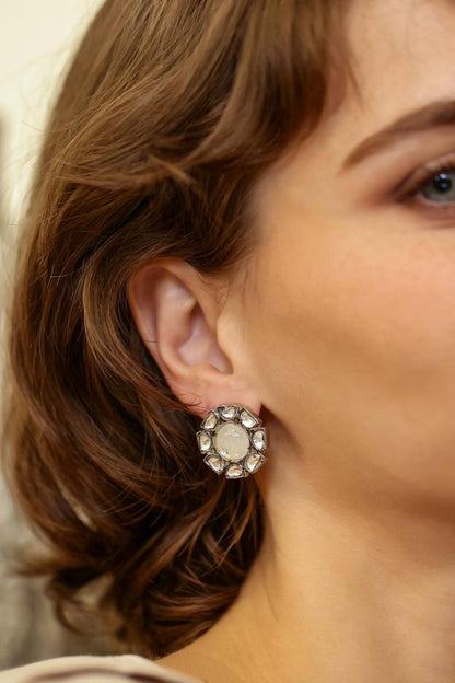 Sunaina studs in Moonstone Polki earrings in 92.5 Sterling Silver in glass Polki, oxidised plating in Push-Post closure.