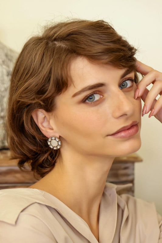 Sunaina studs in Moonstone Polki earrings in 92.5 Sterling Silver in glass Polki, oxidised plating in Push-Post closure.