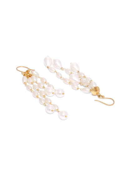 Pearls of joy earrings in 92.5 Sterling Silver with fresh water Pearls hook earrings in 1 micron Gold plating.