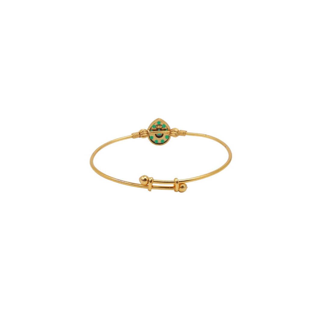 Juhi bracelet in 92.5 Sterling Silver dipped in 1 micron Gold plating with green Onyx Jadau bracelet.