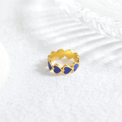 Ishq ring (Blue) in 92.5 Sterling Silver dipped in 1 micron Gold plating with blue Enamel.