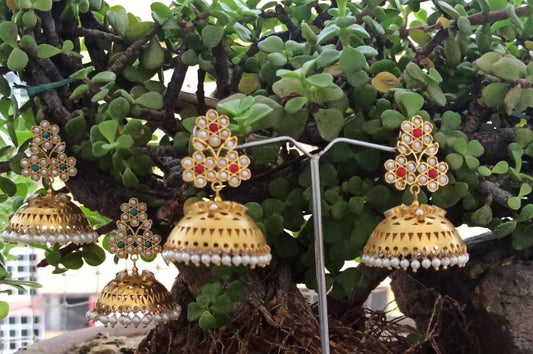 Teen phool jhumka in 92.5 Sterling silver handcrafted gold plated jadau pearl and coral earrings with beaded pearl.