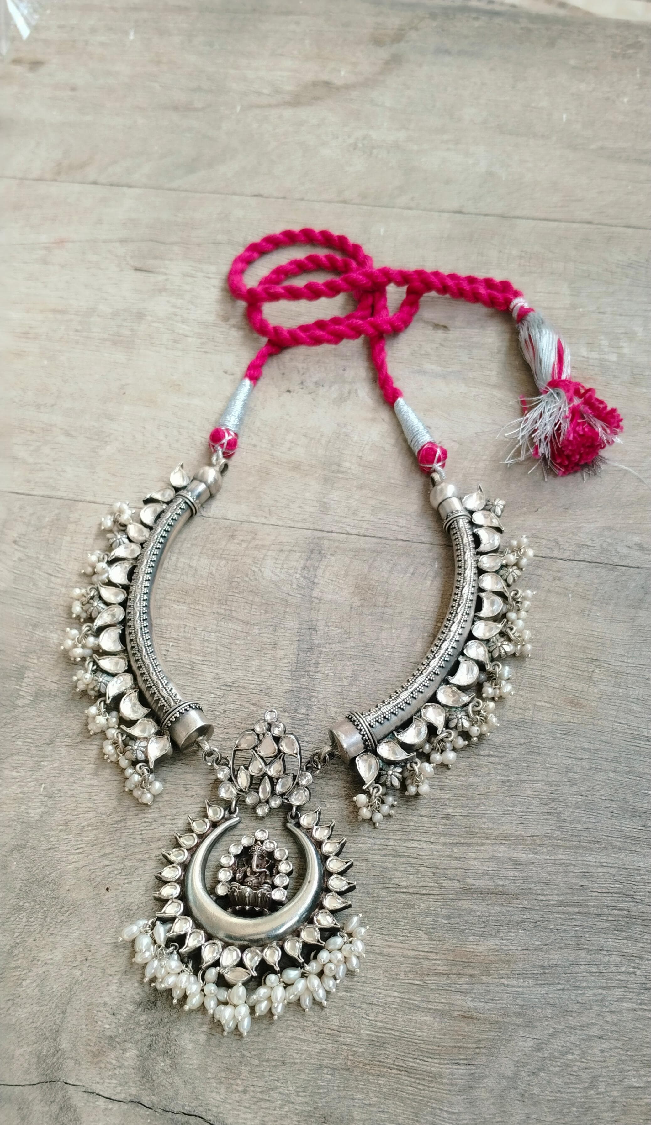 Necklace/Hasli in 92.5 Sterling Silver handcrafted in Polki and Pearls.