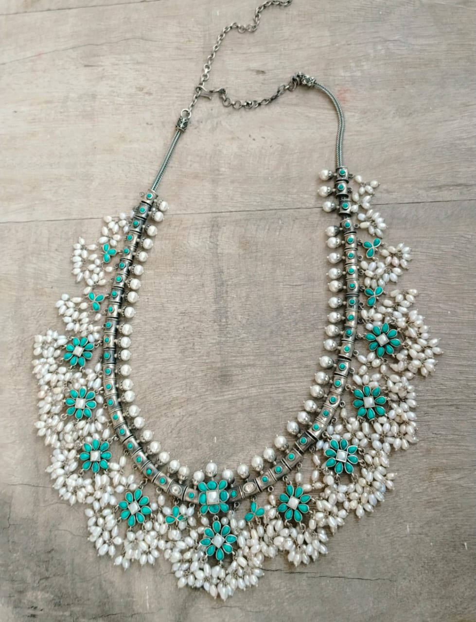 Maanvi necklace in 92.5 Sterling Silver handcrafted in Jadau Turquoise with rice Pearls.