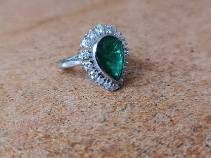 Pear shaped Emerald-Gold ring studded in Diamonds and Gold.