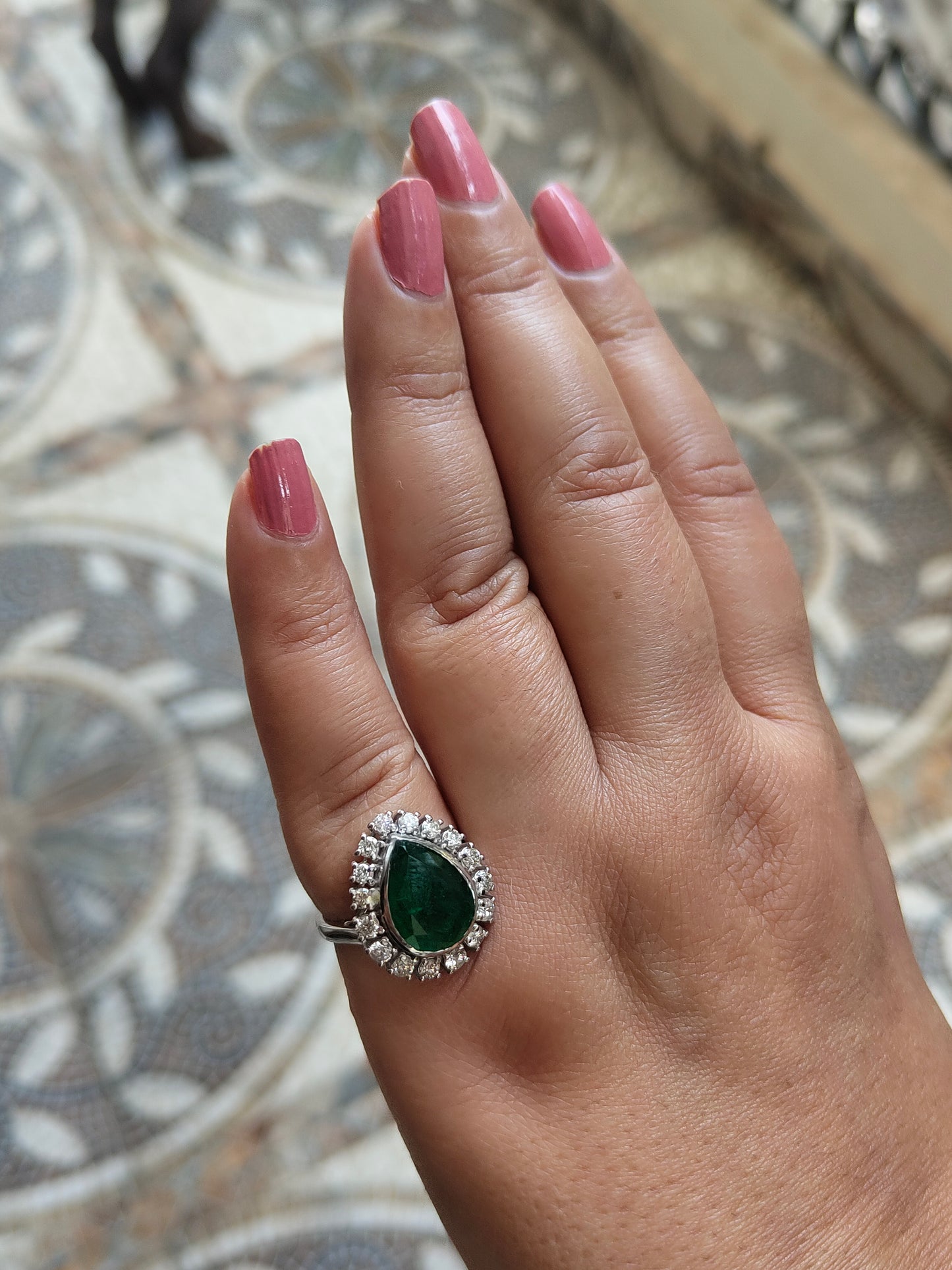 Pear shaped Emerald-Gold ring studded in Diamonds and Gold.