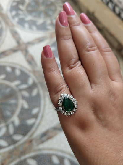 Pear shaped Emerald-Gold ring studded in Diamonds and Gold.