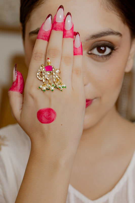 Ele Jadau ring in 92.5 Sterling Silver handcrafted and dipped in 1 micron Gold plating Jadau with red Quartz polki, adjustable.