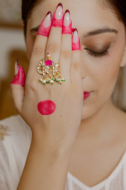 Ele Jadau ring in 92.5 Sterling Silver handcrafted and dipped in 1 micron Gold plating Jadau with red Quartz polki, adjustable.