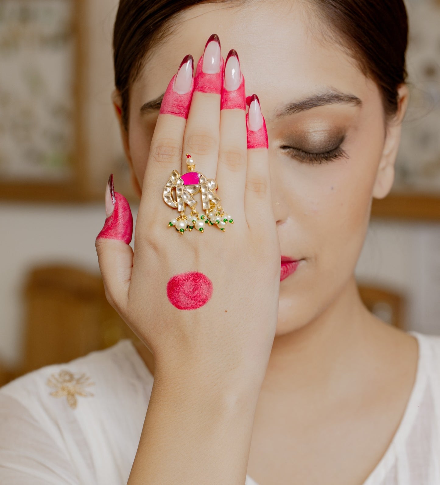 Ele Jadau ring in 92.5 Sterling Silver handcrafted and dipped in 1 micron Gold plating Jadau with red Quartz polki, adjustable.