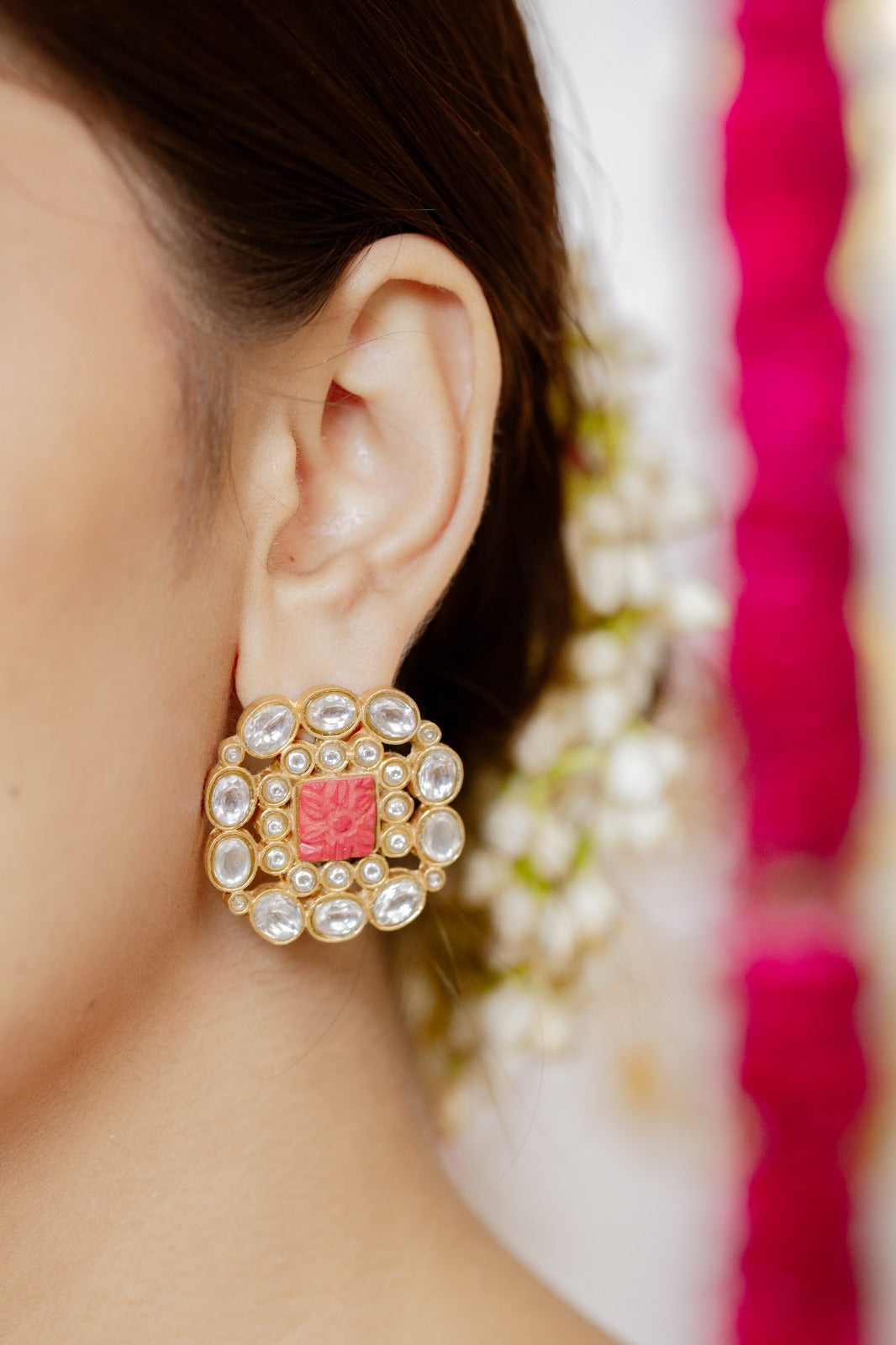 Kesari earrings in 92.5 Sterling Silver handcrafted and dipped in 1 micron Gold plating with Jadau-Polki in traditional coral carvings.