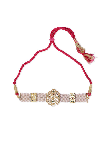 Nargis choker handcrafted and dipped in 1 micron Gold plating with cutwork in with red and green stones, size adjustable with a traditional Sarafa closure.