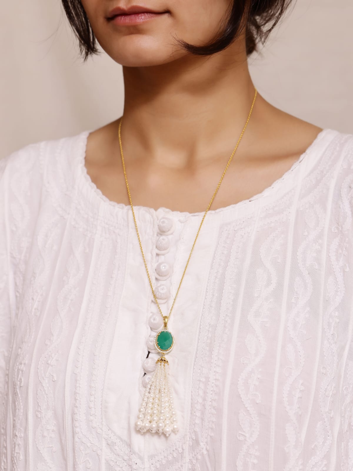 Green Onyx Tassel necklace in 92.5 
Sterling Silver with faceted green Onyx and Pearls with cz.