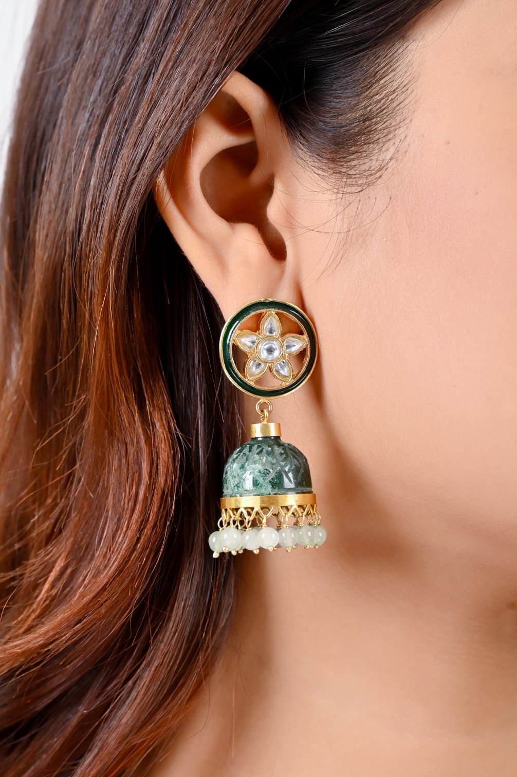 Stone Jhumka in 92.5 Sterling Silver handcrafted and dipped in 1 micron Gold plating with Jadau-Polki in traditional green Onyx.
