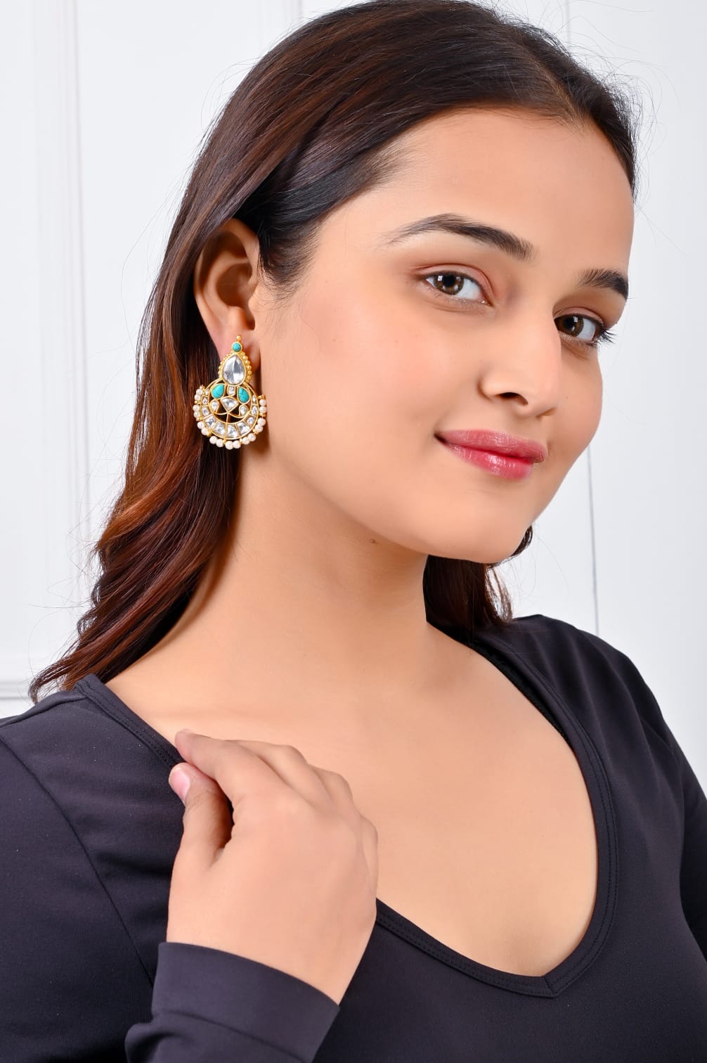 Earrings in 92.5 Sterling Silver handcrafted and dipped in 1 micron Gold plating in Jadau-Polki in  traditional Turquoise.