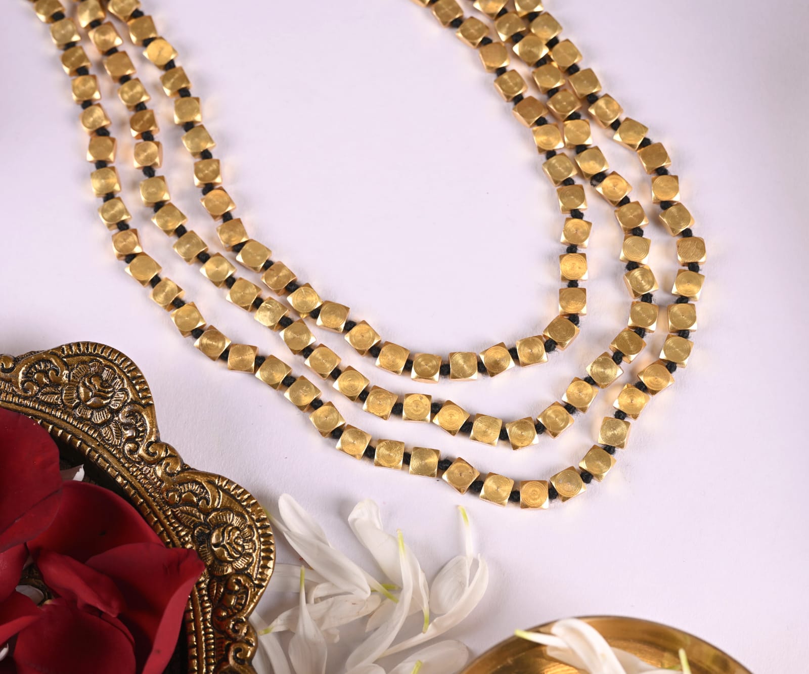 Mandal necklace in 92.5 Silver Alloy, handcrafted and dipped in 1 micron Gold plating with Dokhra beads in Tri-Lined design.