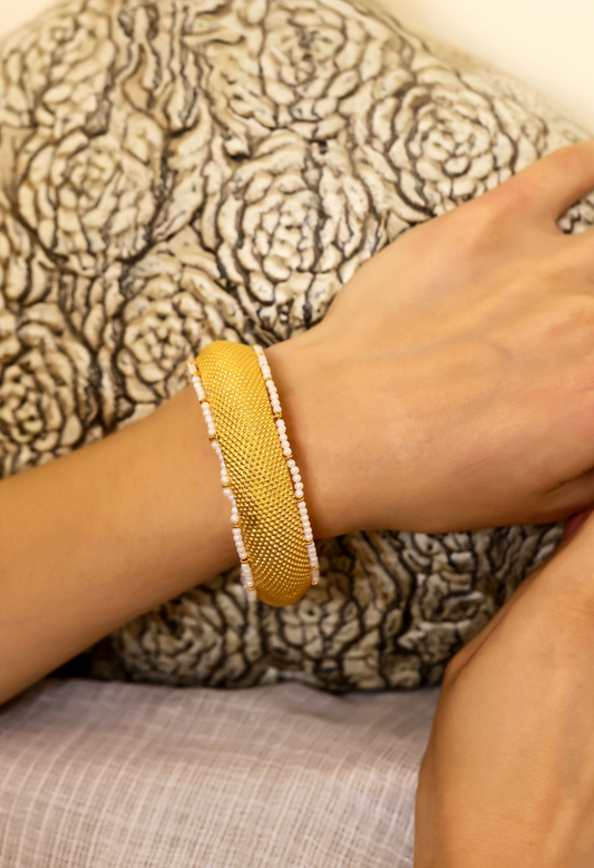 92.5 Sterling Silver and Gold plated bangle with textured Gold plated and Pearl around the bangles.