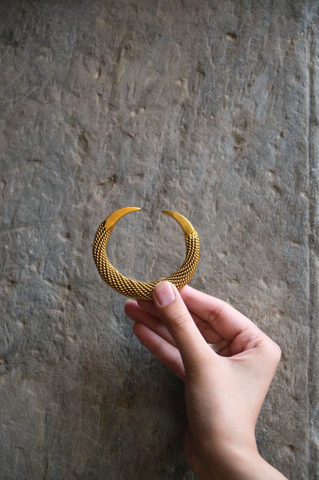 Jaali kara 
in sterling Silver with 1 micron gold plating, Strands of silver knotted together, adjustable.